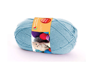 Ball of yarn, regular yarn in powder blue color